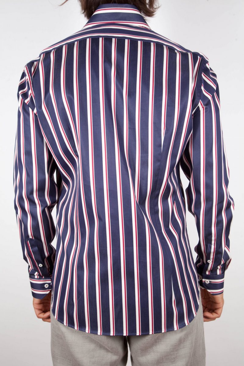 Shirt with blue and white lines.